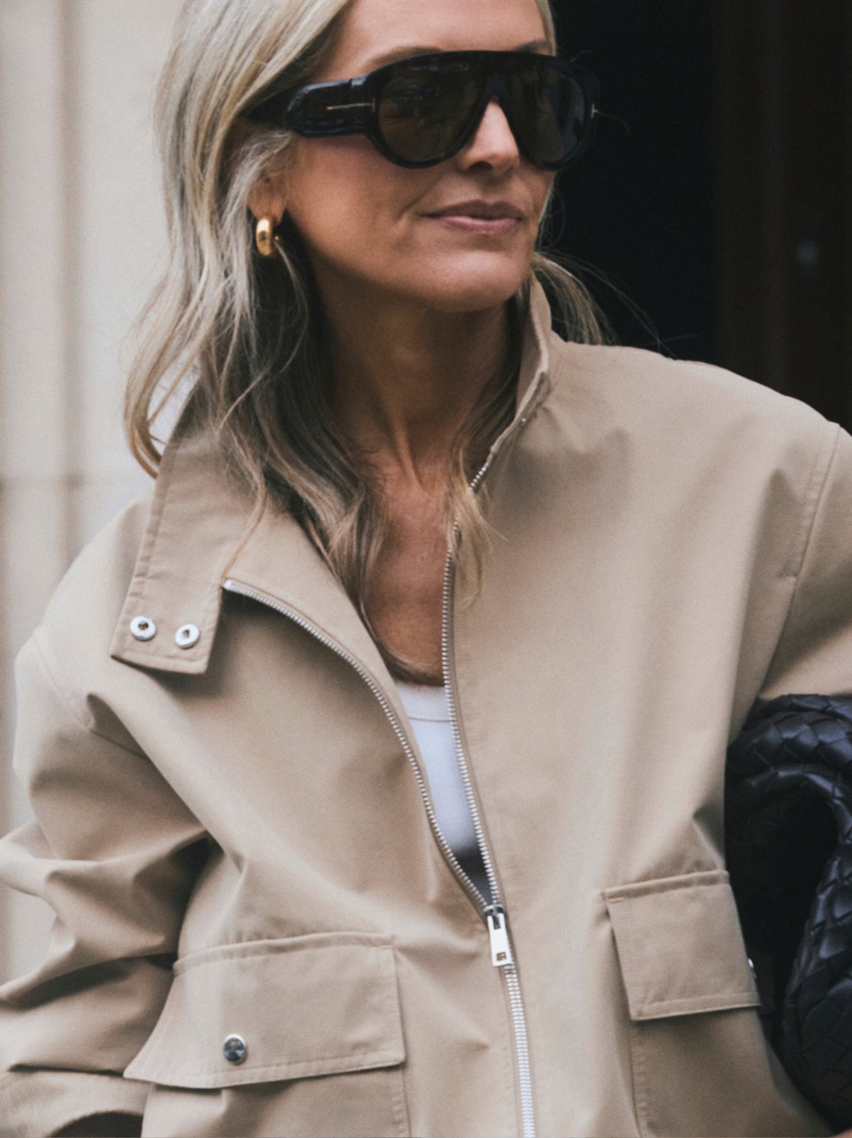 Model in a pale jacket and sunglasses in ALIGNE’s SS26 campaign