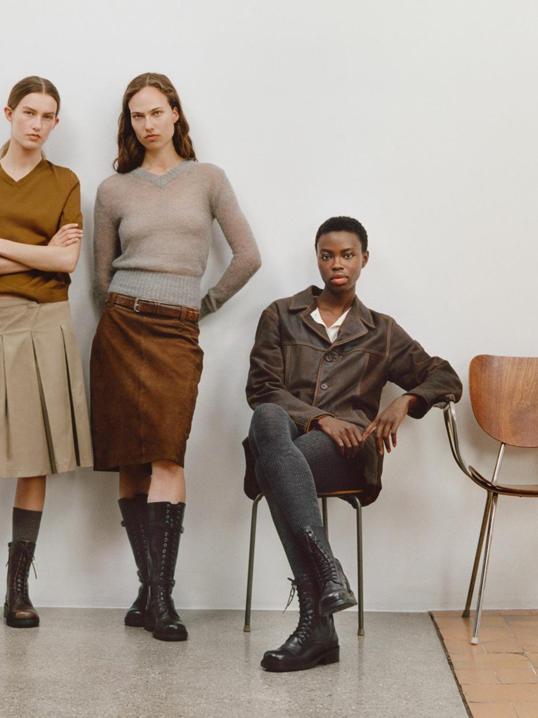Three models in autumn looks and Vagabond boots