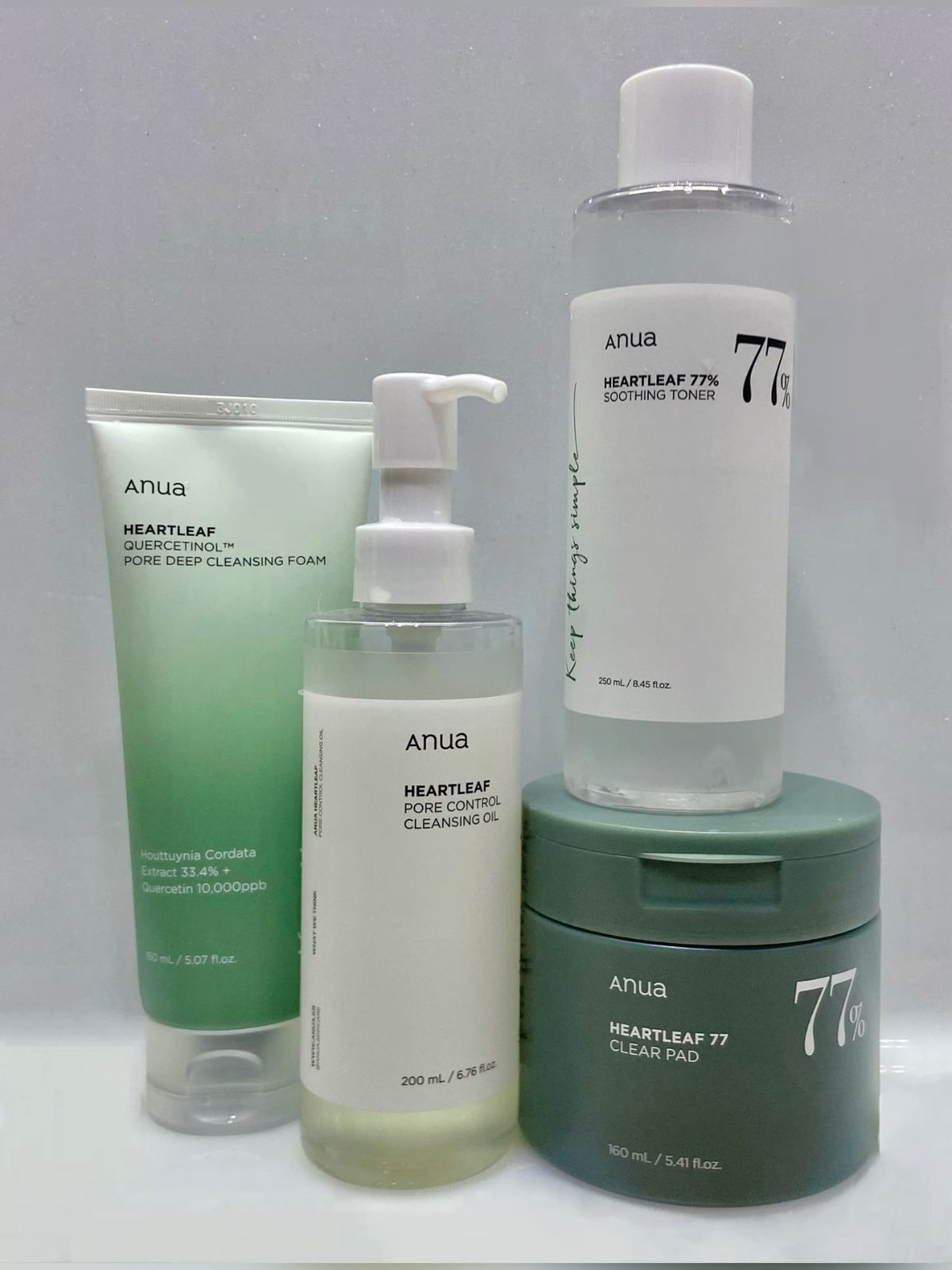 Anua Heartleaf cleansing foam, oil, toner and clear pad grouped together