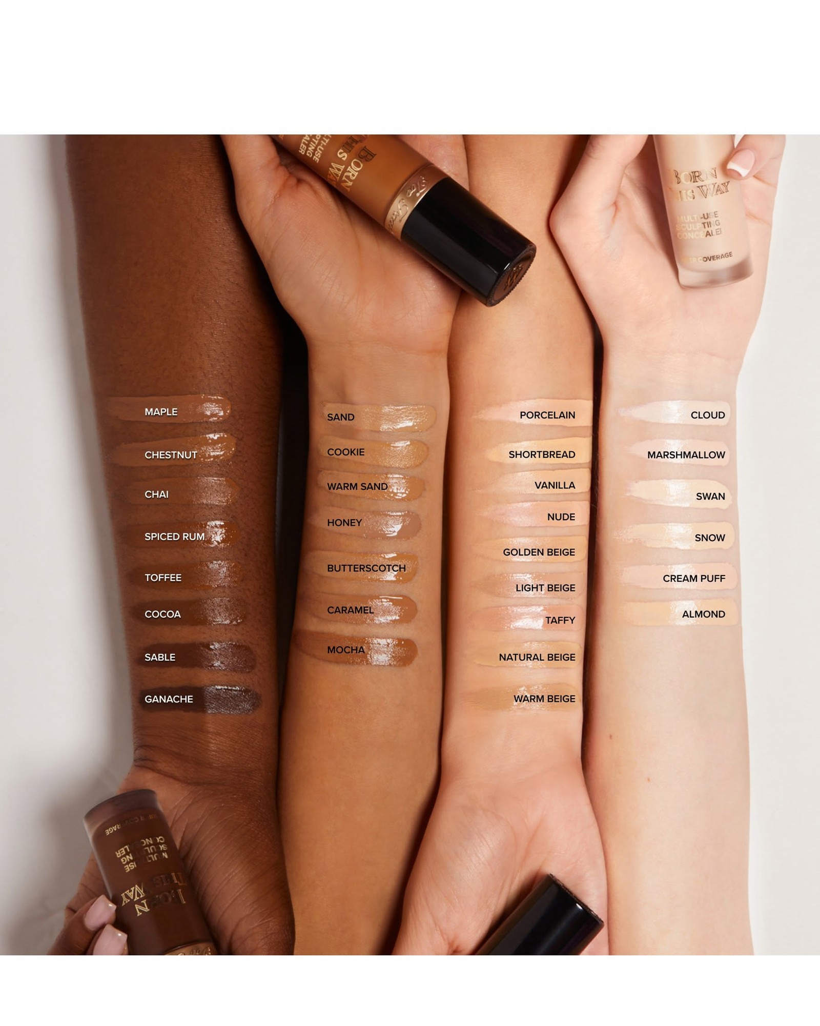 Four arms in a row from deep to fair, each swatched with Born This Way concealer shades labeled from Maple and Ganache to Cloud and Almond