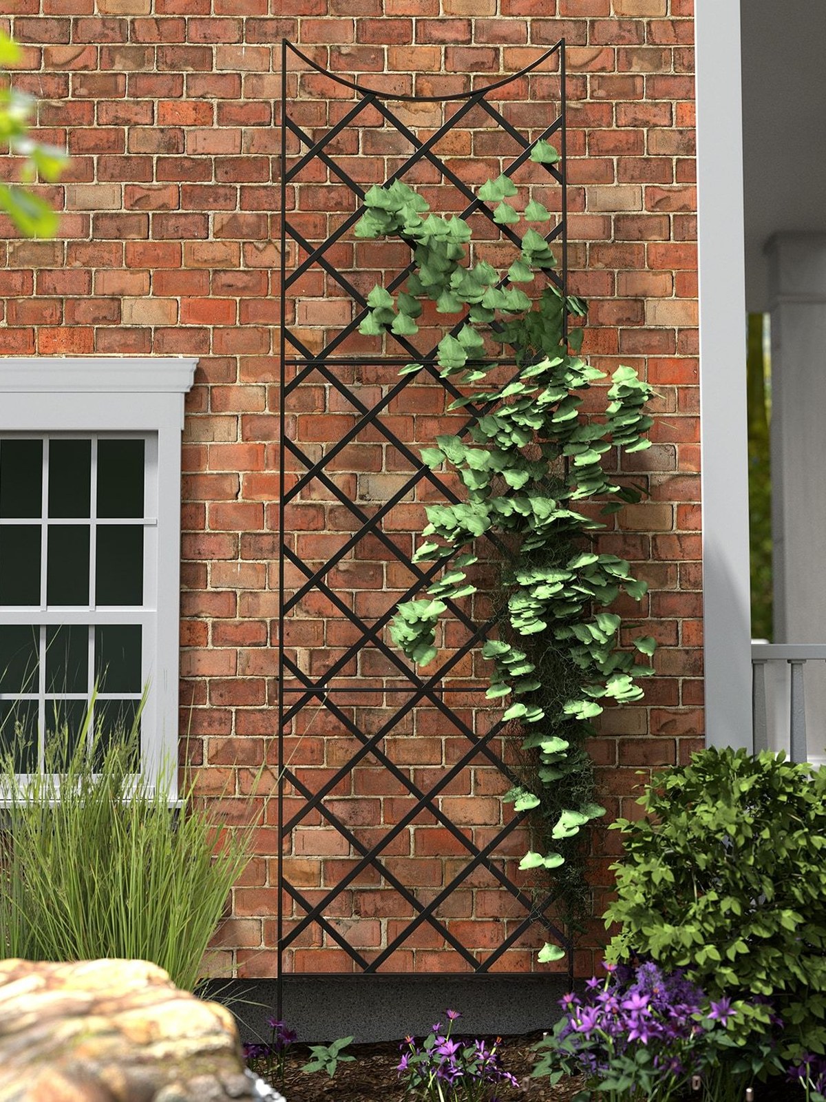 Black diamond trellis with a climbing vine on a brick wall