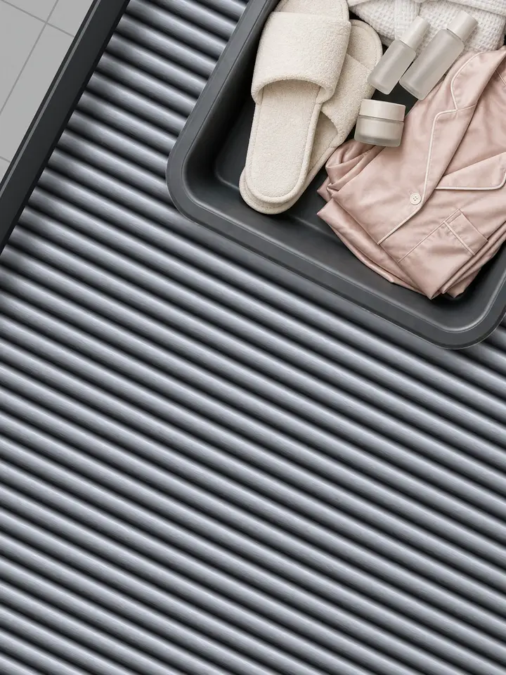 Phia ad: packed airport security trays for a spa weekend, a desert festival and a lake weekend slide down a conveyor. Let Phia do the packing for you. Install your free digital closet today.