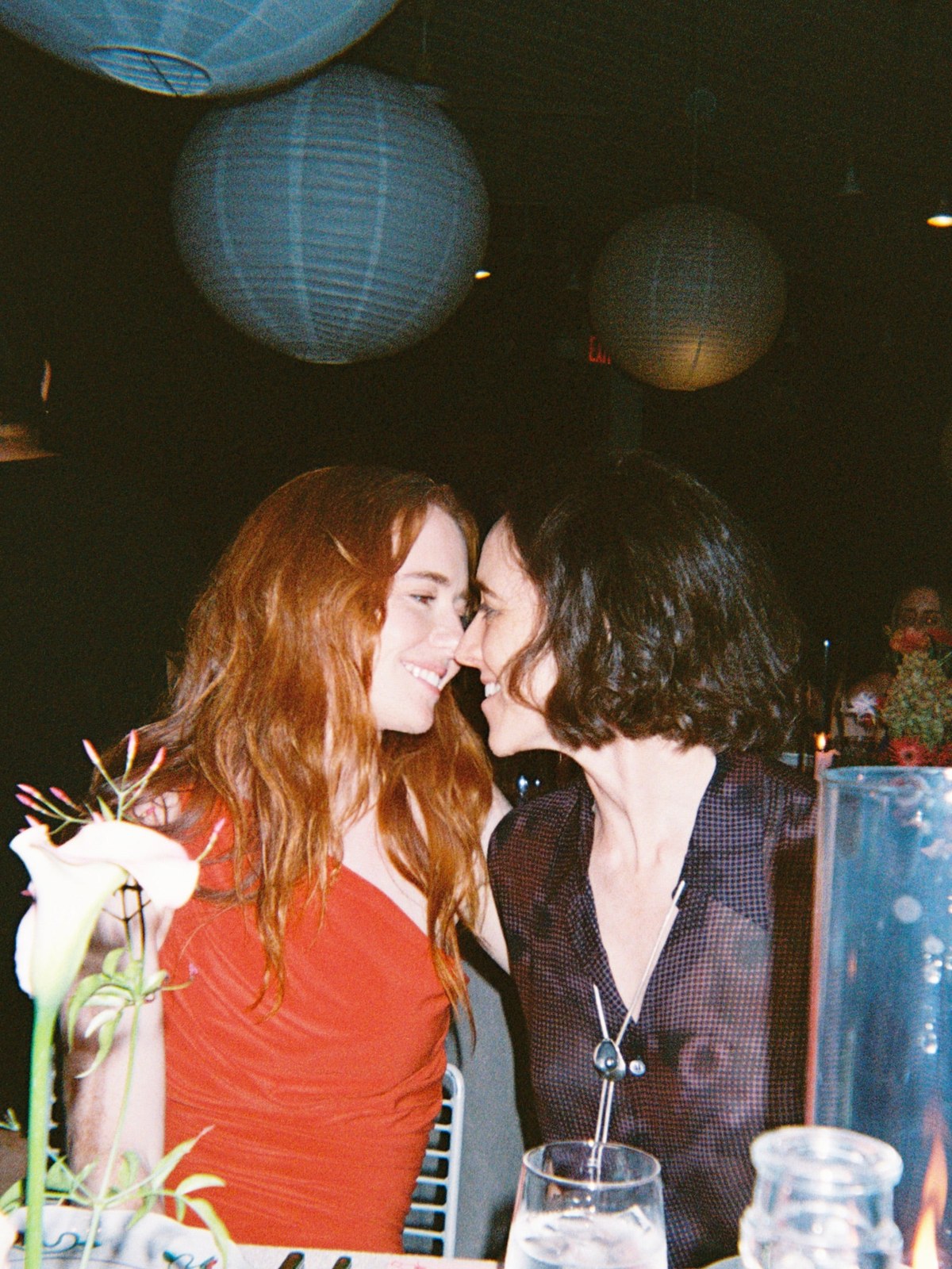 Kate Owen and Julia Platt Hepworth sharing a moment at dinner