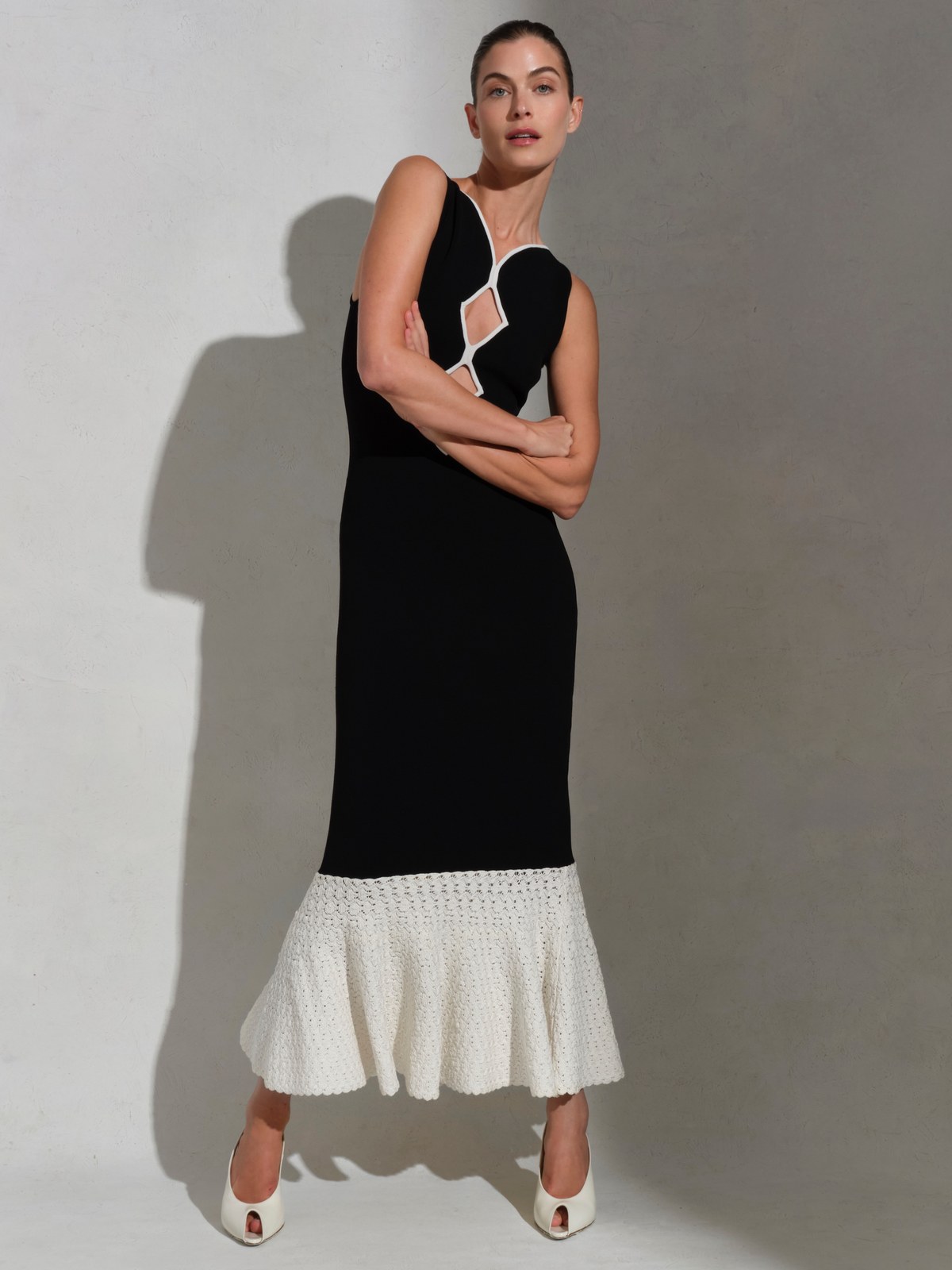 Model in a black and white dress from the ET OCHS Spring 2026 lookbook
