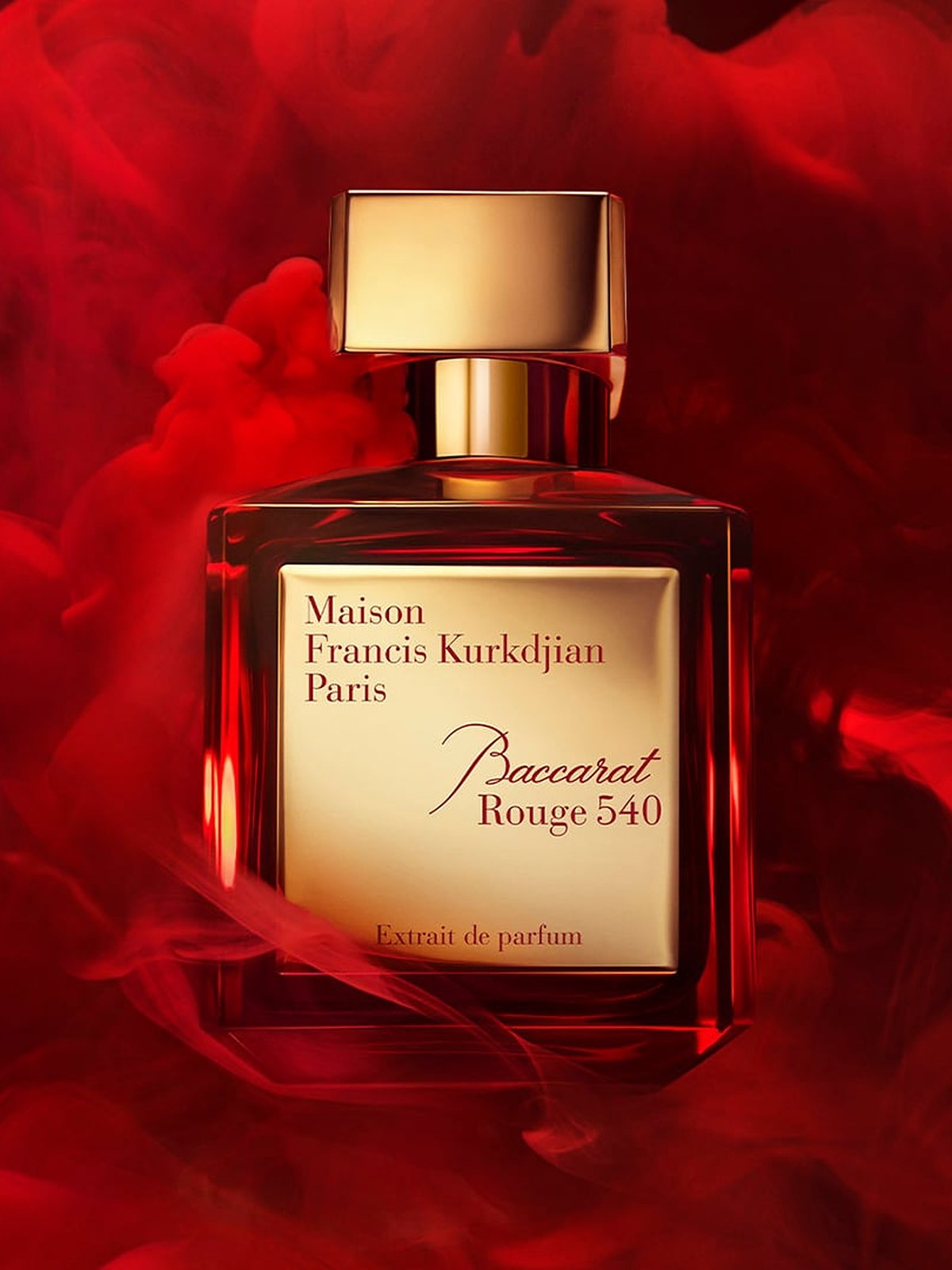 Baccarat Rouge 540 bottle in swirling red smoke