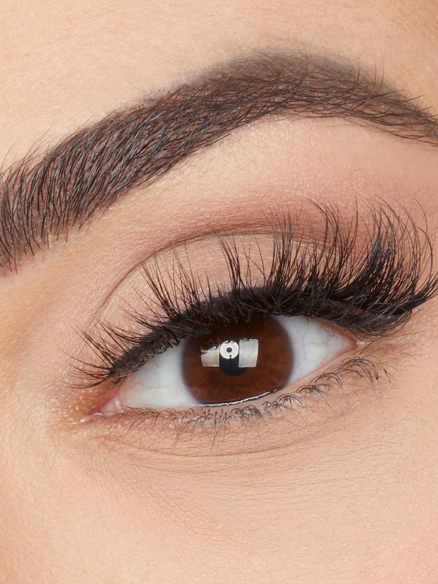 Close-up of an eye wearing fluffy false lashes