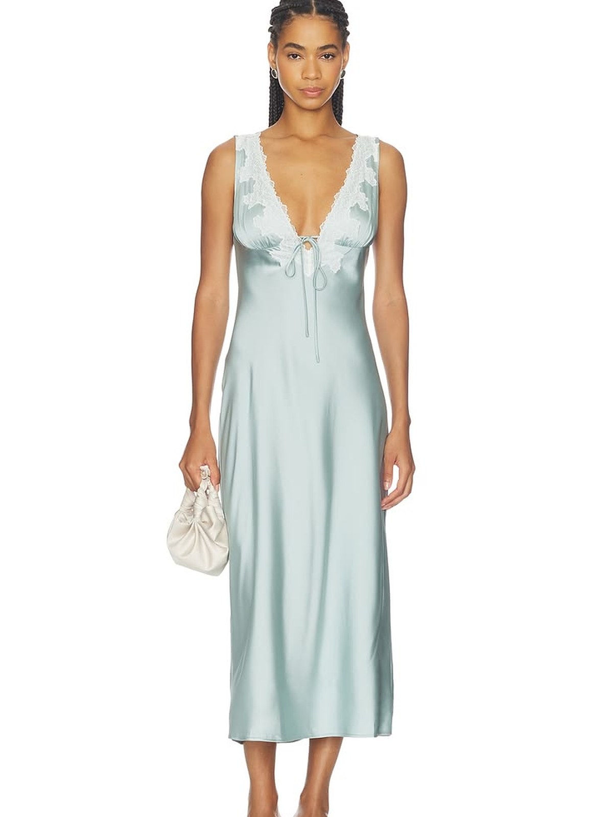 Model in a mint satin slip dress