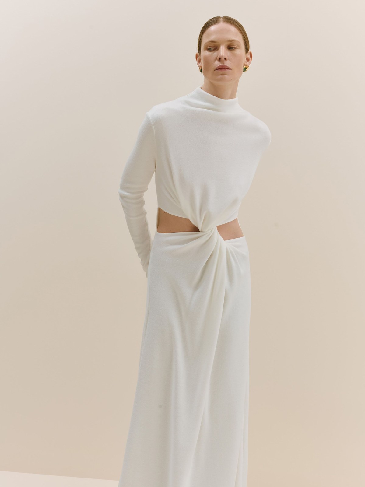 Model in a white draped top and long skirt for Bevza Fall 2026