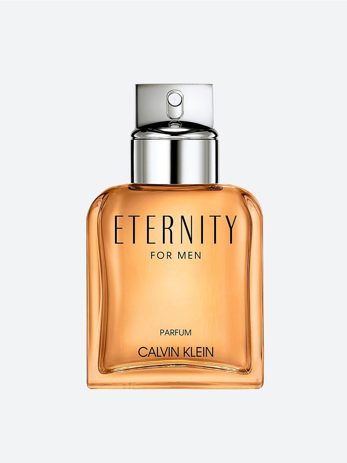 Amber bottle of Calvin Klein Eternity for Men Parfum with a silver cap on a pale grey background