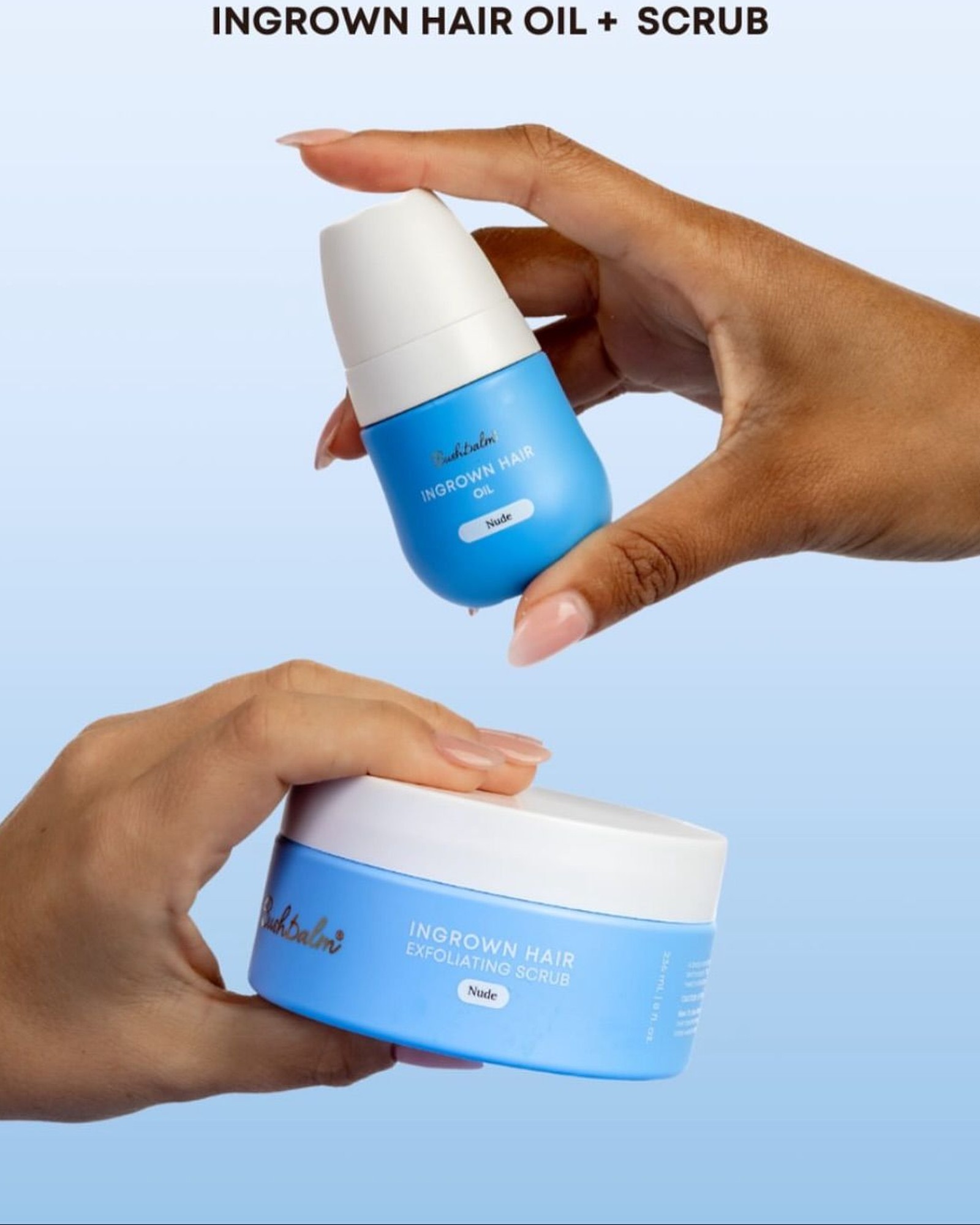 Two hands holding a blue Bushbalm Ingrown Hair Oil bottle above a matching Ingrown Hair Exfoliating Scrub jar on a pale blue background