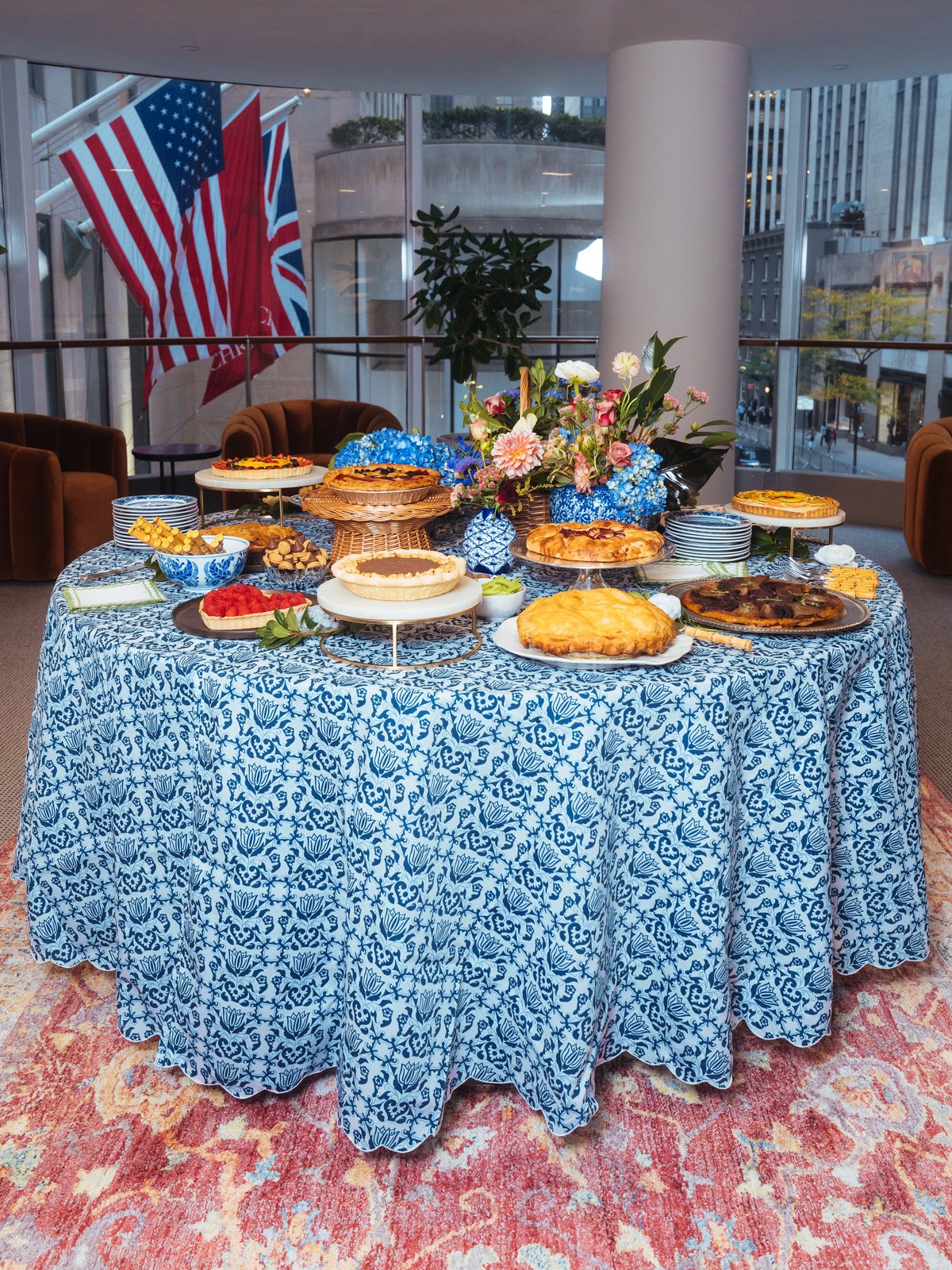 Pie buffet on a blue patterned tablecloth in a New York dining room