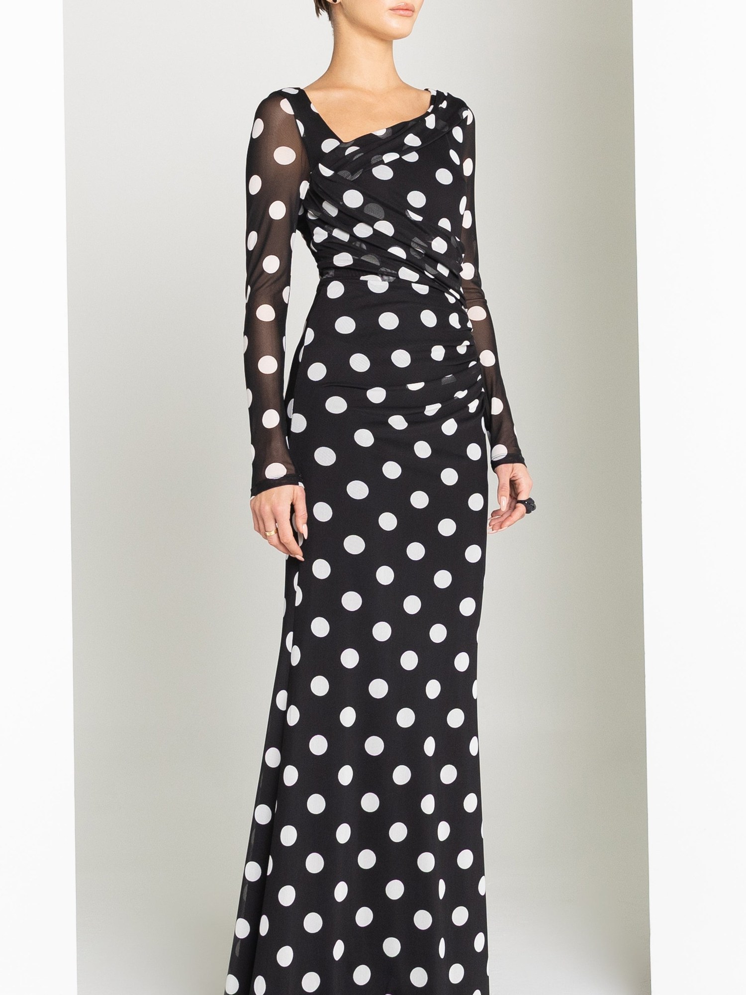 Polka dot long sleeve ruched gown in black and white