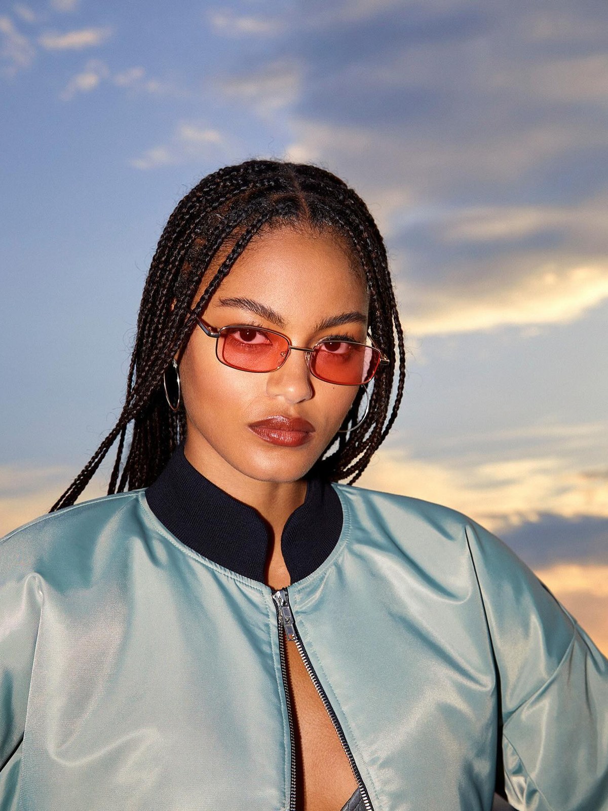 Portrait wearing tinted sunglasses in the California Dreams campaign.