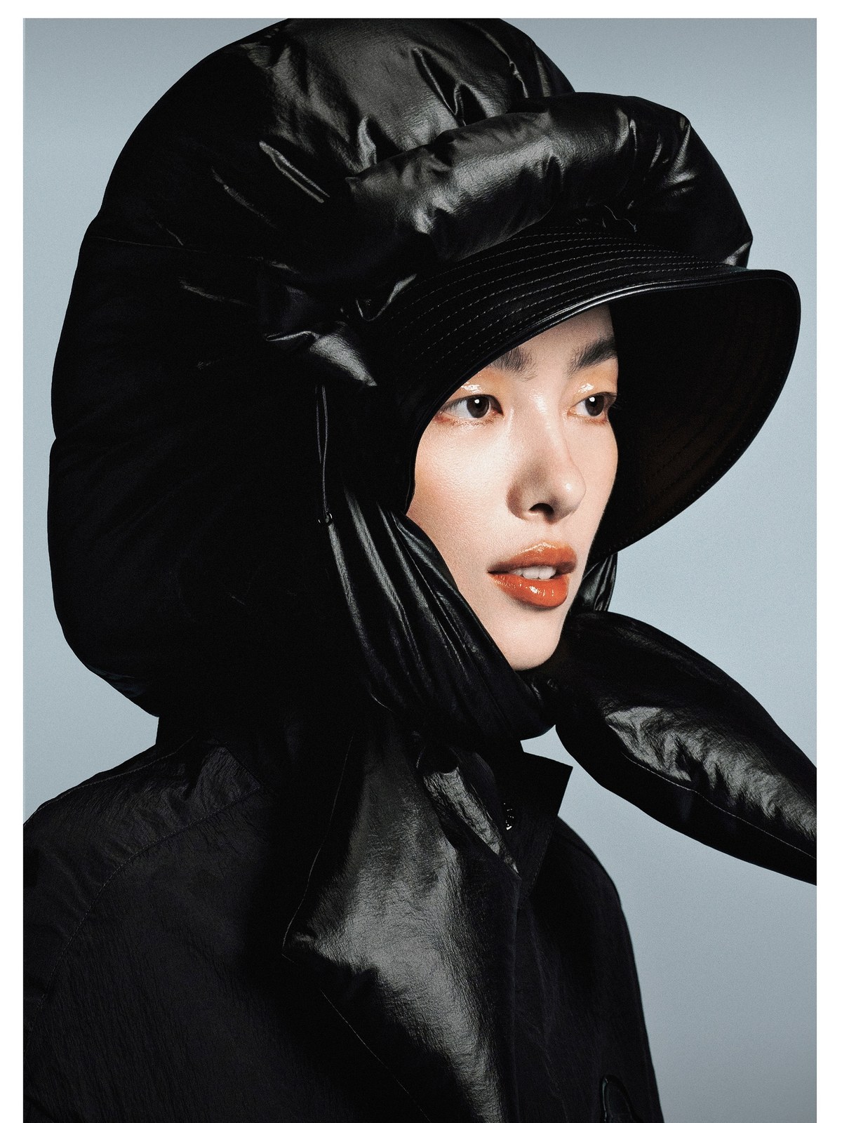 Fei Fei Sun in a hooded look from Moncler x EE72 by Edward Enninful, photographed by Zhong Lin for Vogue China, 2025