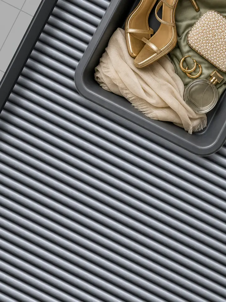 Phia ad: packed airport security trays for a wedding guest, a bachelorette weekend and a black-tie wedding slide down a conveyor. Let Phia do the packing for you. Install your free digital closet today.