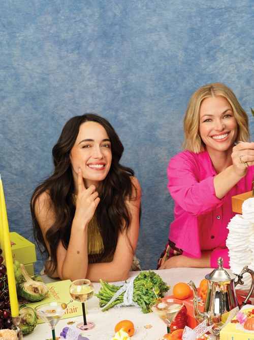 Piecework cofounders Rachel Hochhauser and Jena Wolfe at a colorful table