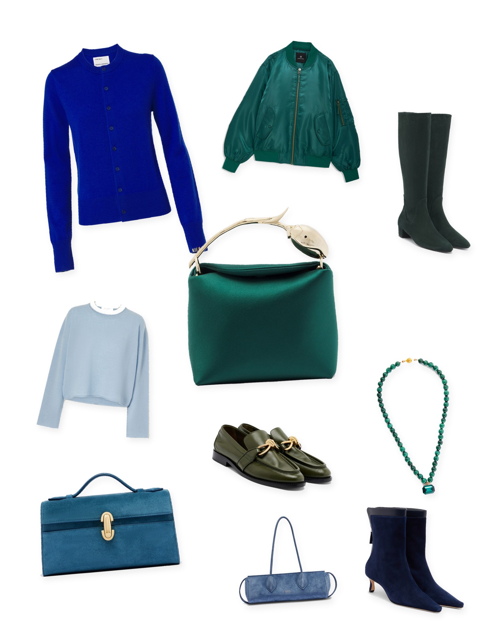 Flat lay of a cobalt cardigan, an emerald satin bomber, green suede knee boots, an emerald satin bag, a pale blue sweater, a malachite necklace, blue suede bags, olive loafers and navy suede ankle boots on white.