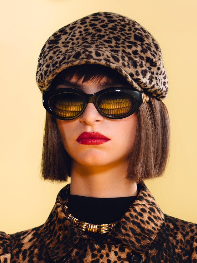 Model in a leopard beret and sunglasses for the Banana Rush campaign