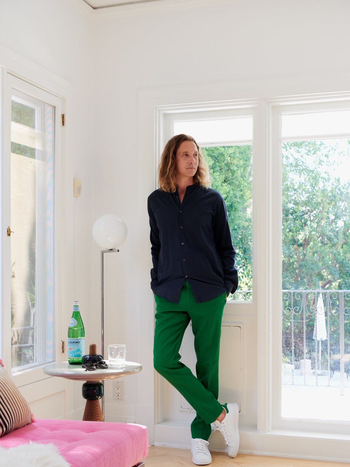 Marie du Petit Thouars standing in a sunlit room at home
