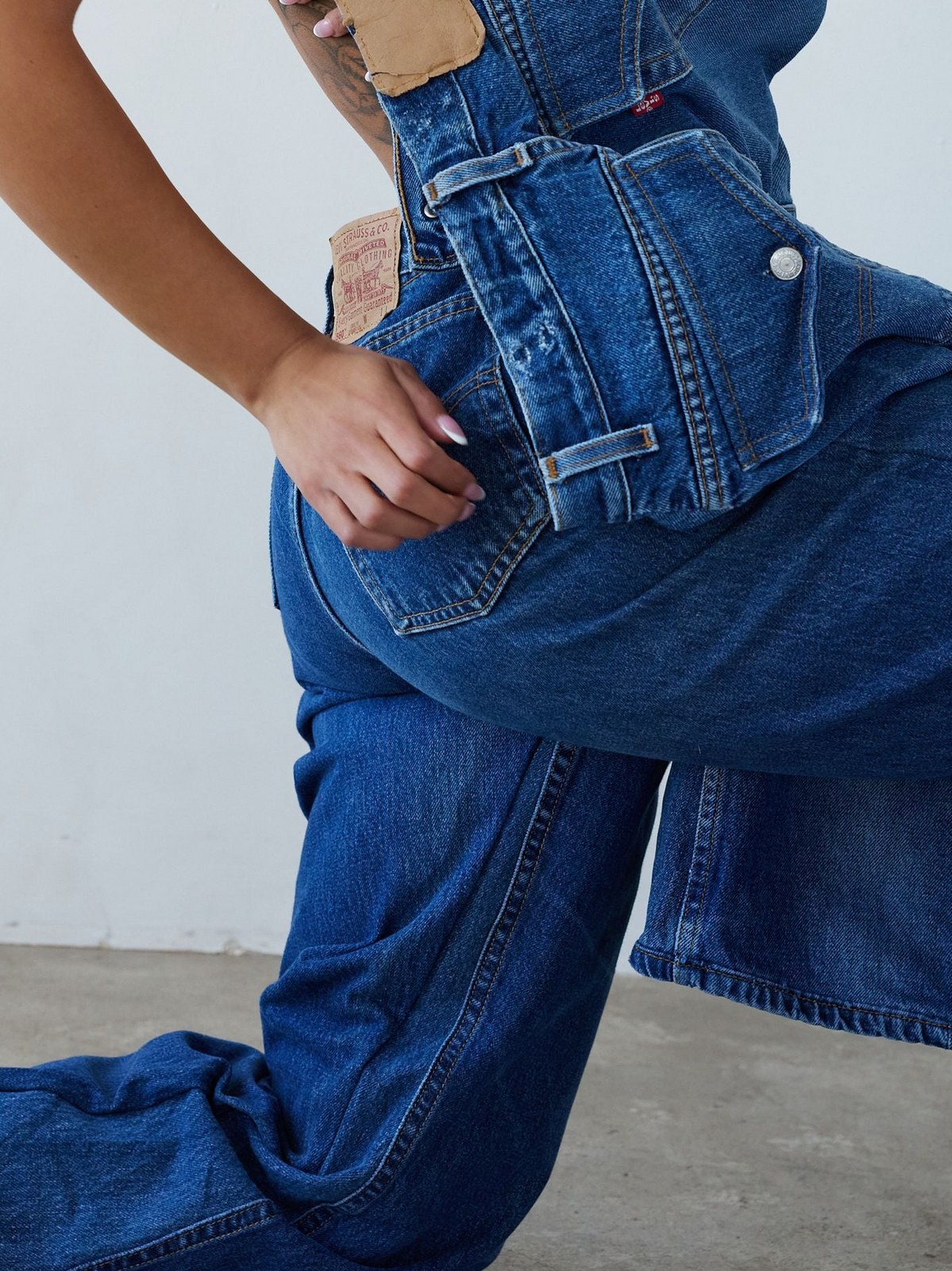 Close-up of a reworked denim jacket with vintage details
