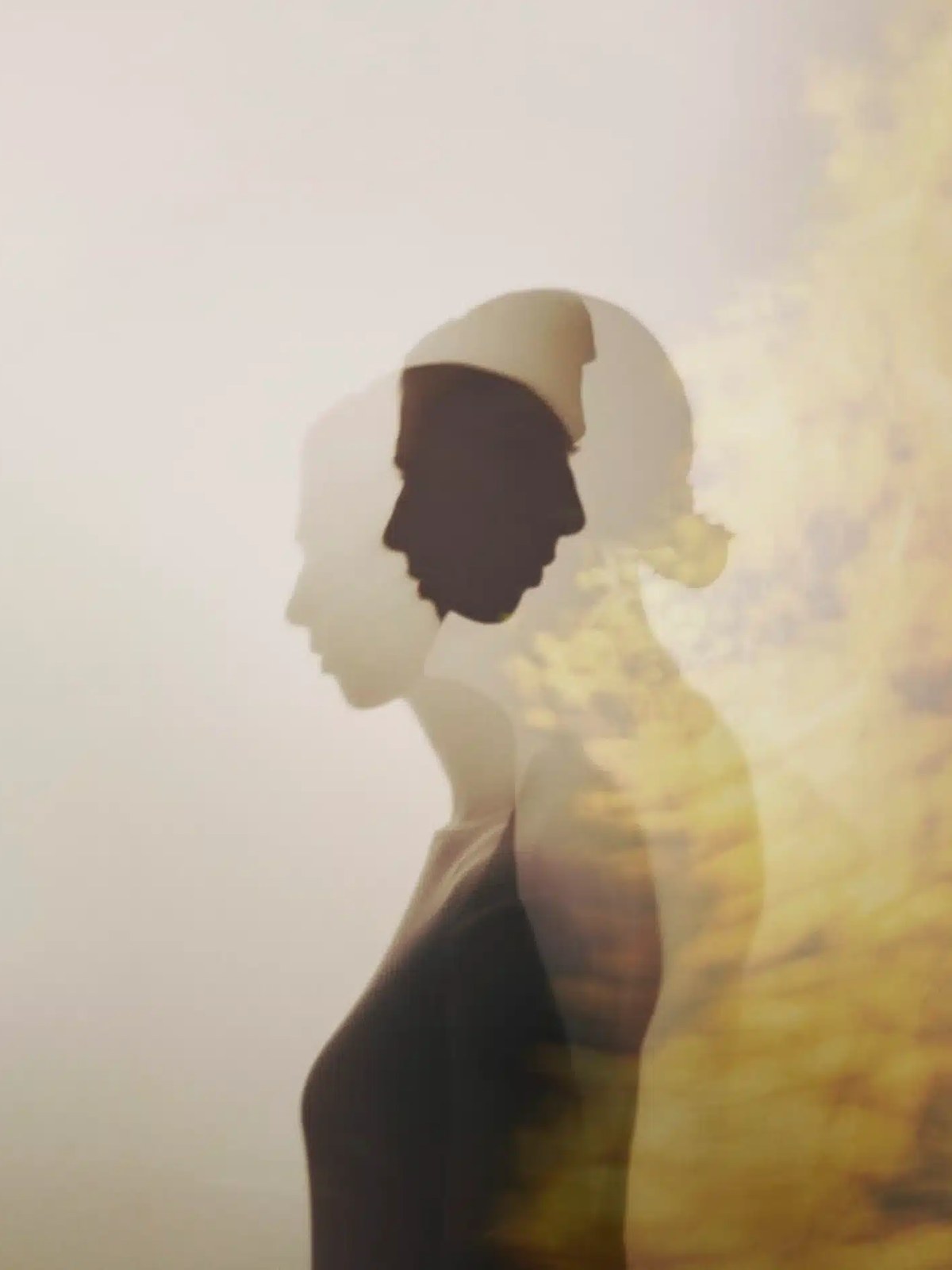 A shadowed figure dissolves into a warm landscape in an Aesop fragrance campaign