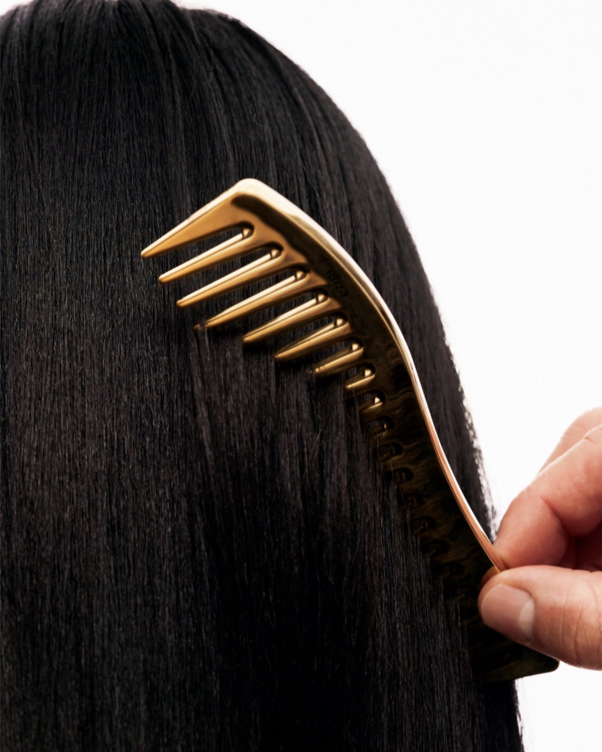 The Wide Tooth Comb Is the Least Glamorous Tool That Saves My Hair