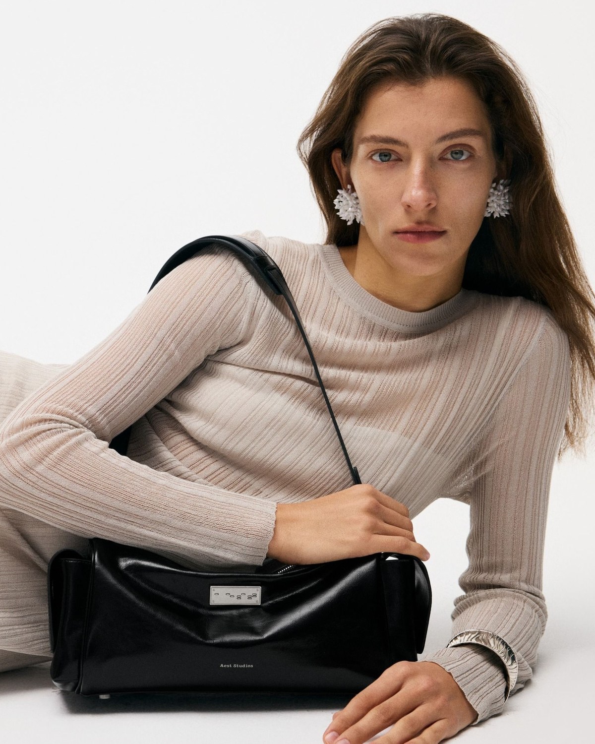 Luxury Birthday Gifts for Her: A Stone, a Woven Bag, and a Silk Set