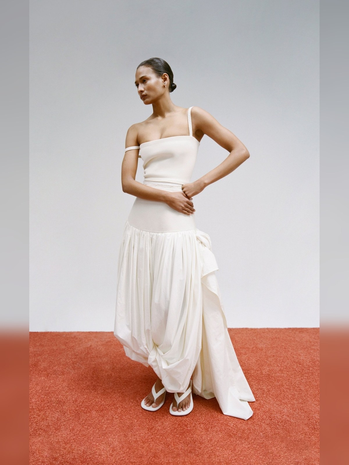 Ivory Draped Gallery Night outfit: Sculptural minimalism for a gallery opening.