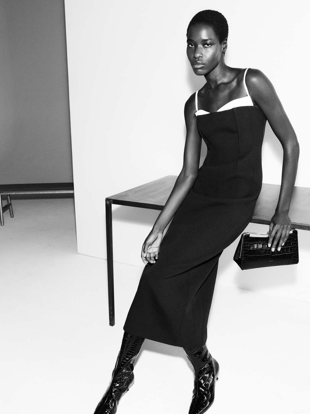 Black Column Dinner outfit: Clean lines for a late reservation.