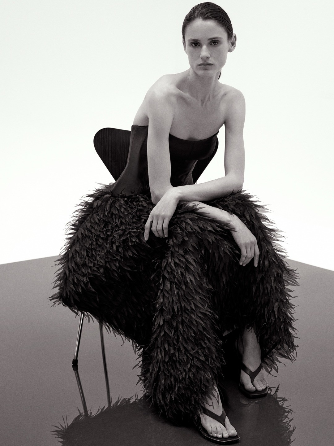 Black Feather Night Out outfit: Texture-heavy and moody for a night out.