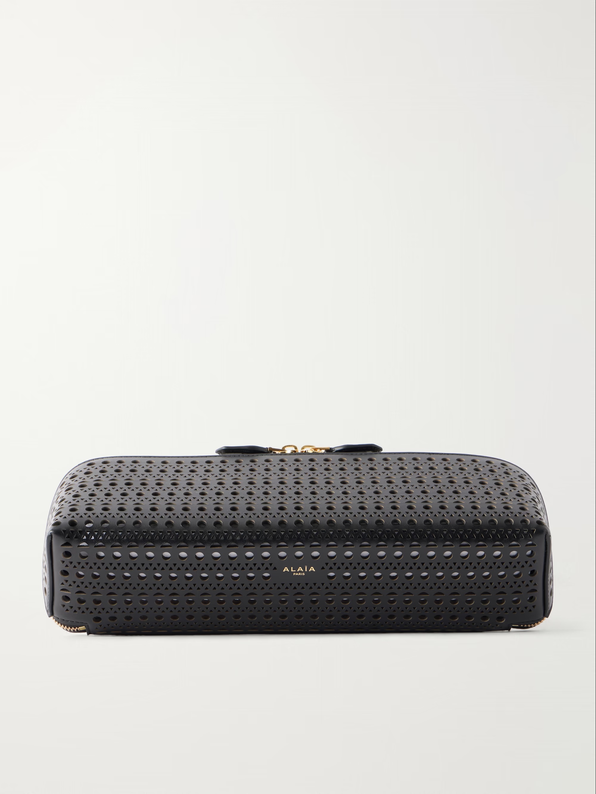 Delta laser-cut leather clutch