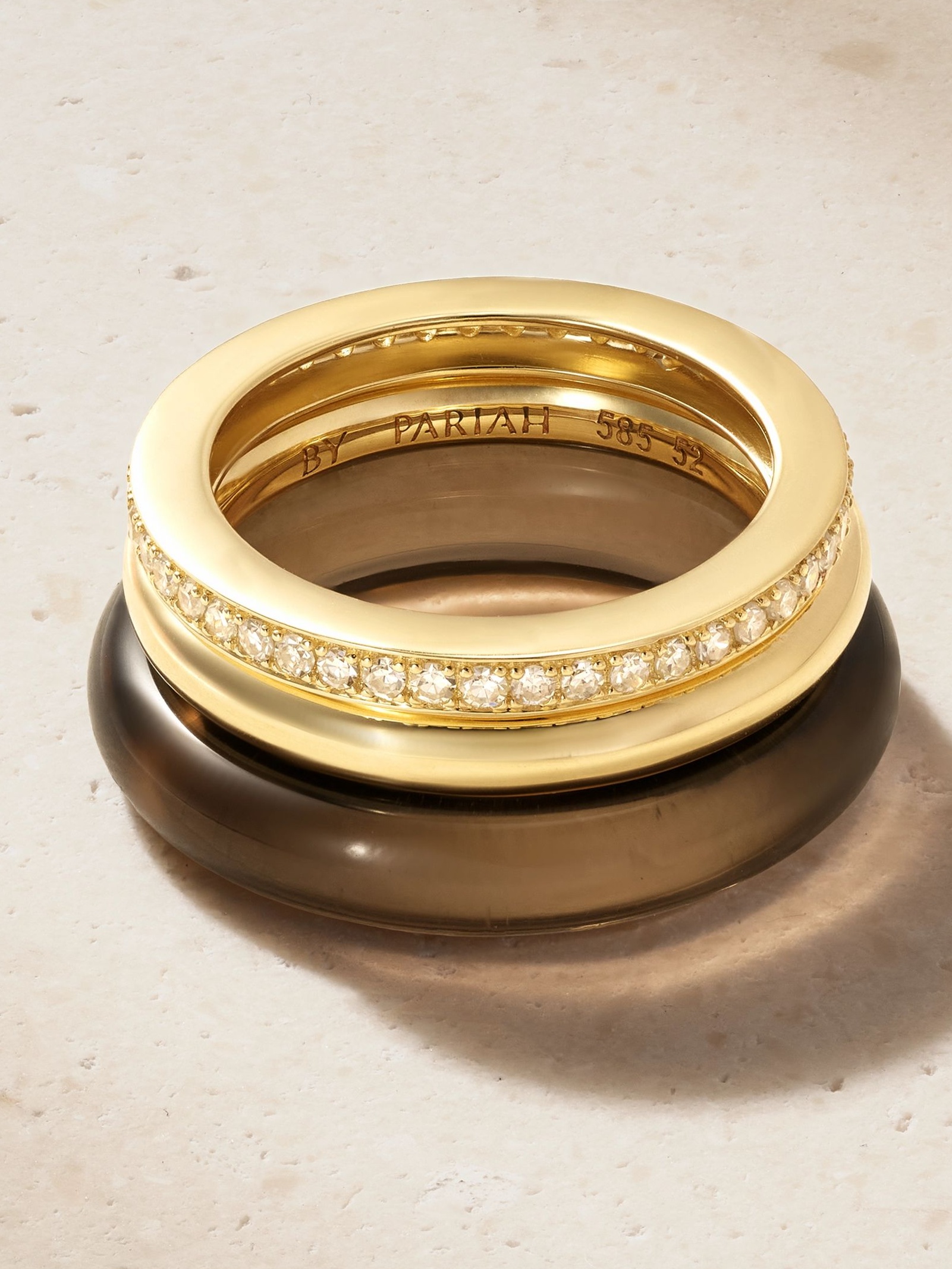 Set of three 14-karat gold, diamond and smokey quartz rings
