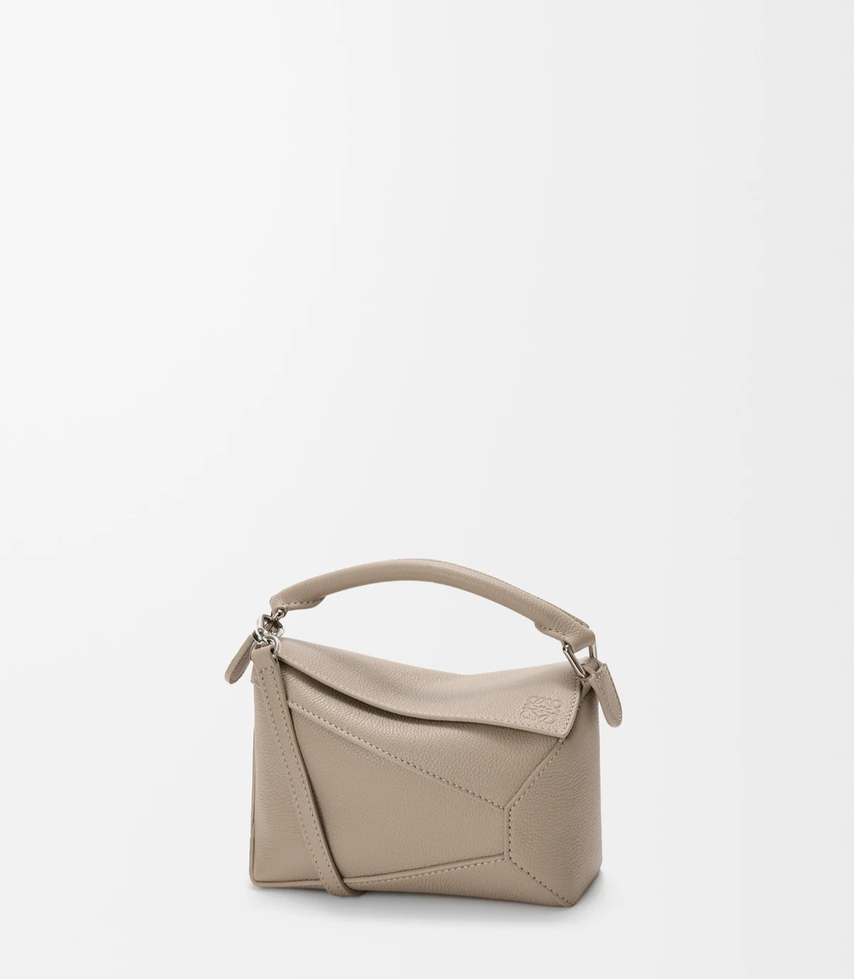 Puzzle Edge Mini leather top-handle bag