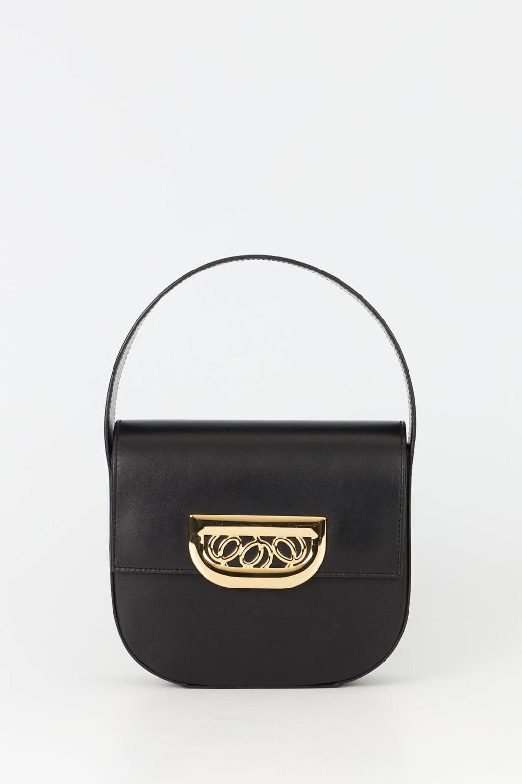 Black leather bag with golden latch