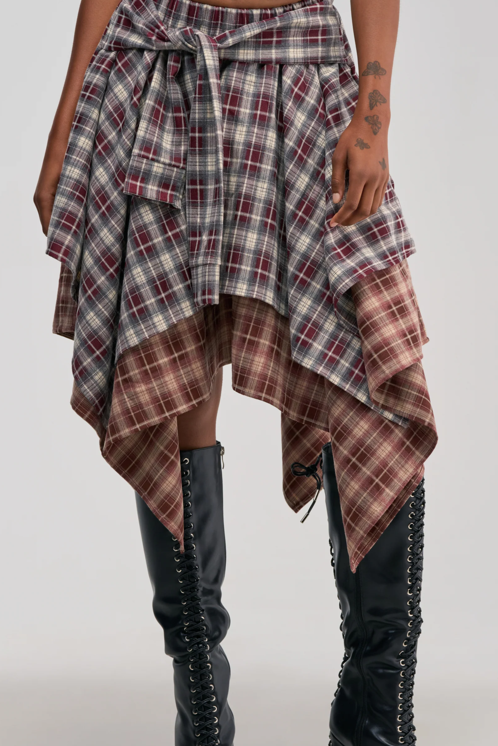 FEELING ALL OVER THE PLACE PLAID MIDI SKIRT