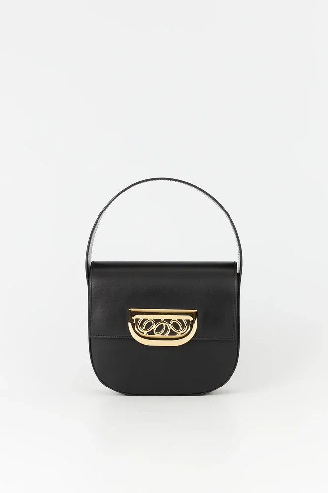 Black leather bag with golden latch