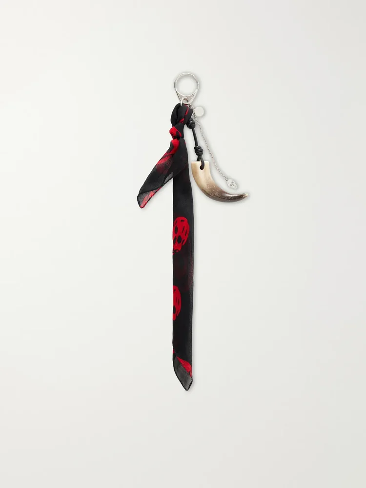 Silver-toned leather-trimmed printed woven horn keychain