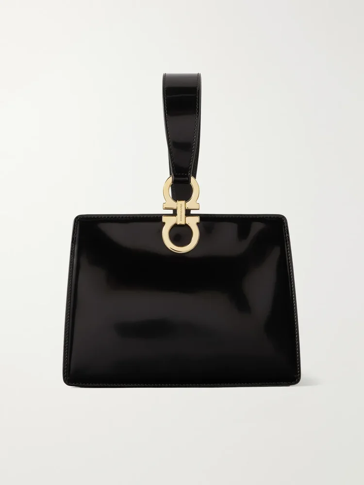 Mini embellished glossed-leather clutch