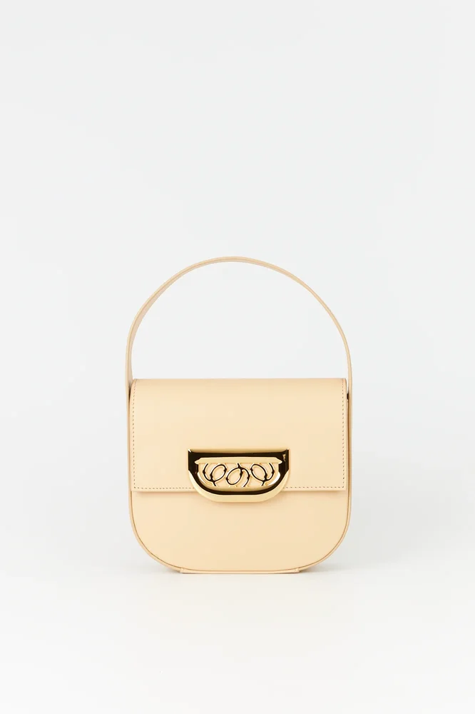 Beige leather handbag with golden latch