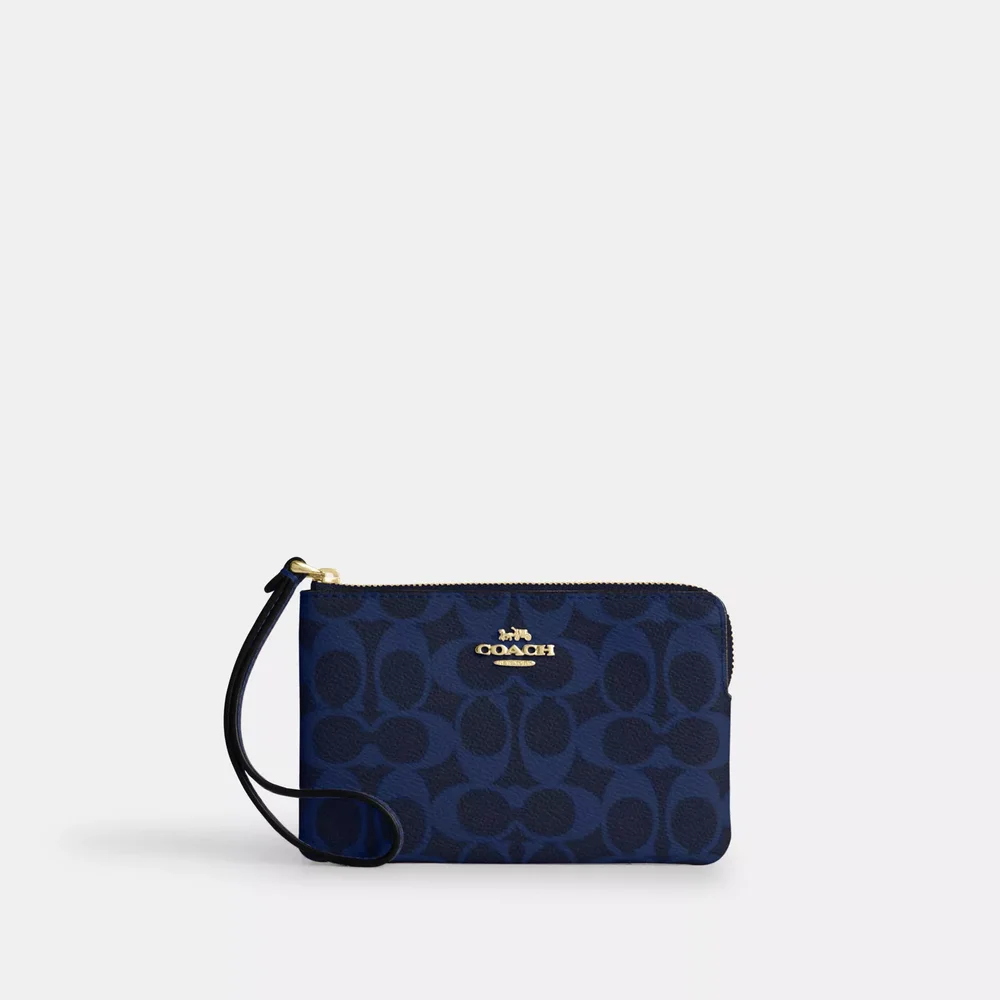 Corner Zip Wristlet In Signature Canvas