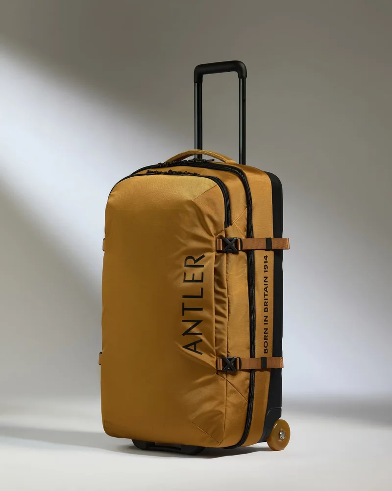 Discovery Wheeled Duffel in Mustard Yellow