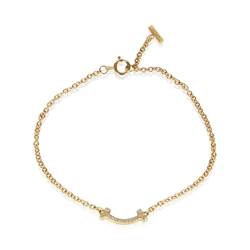 Pre-Owned Tiffany T Smile Bracelet in Yellow Gold with Diamonds