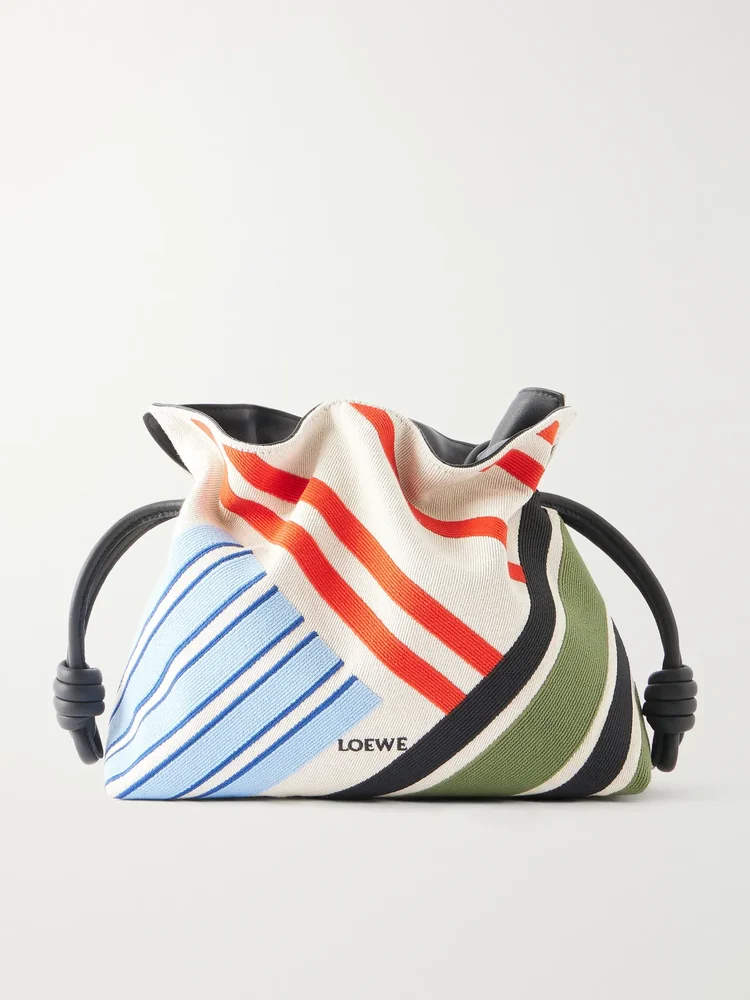 Flamenco leather-trimmed paneled striped canvas clutch