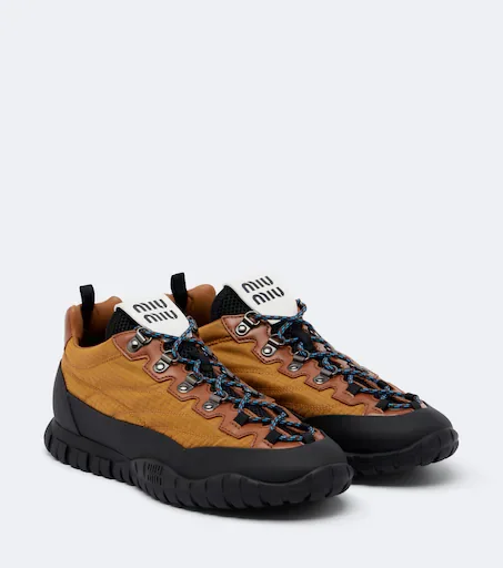 Leather-trimmed sneakers in yellow