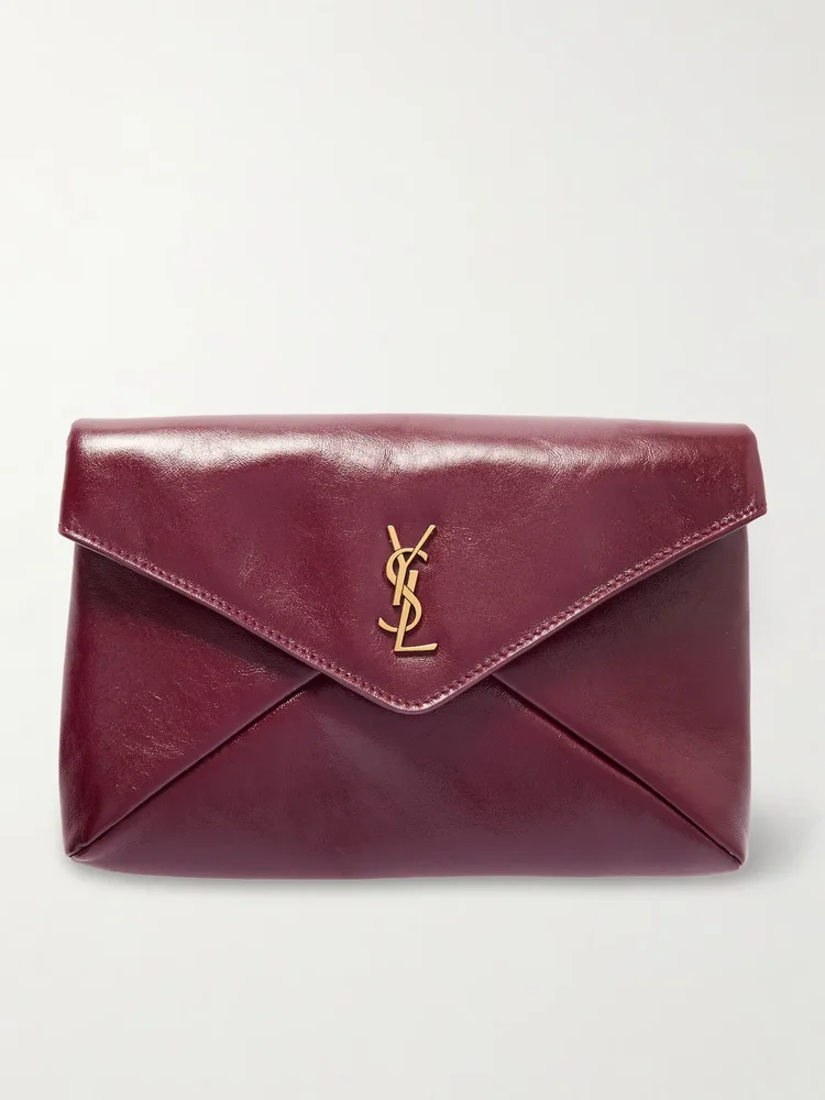 Cassandre large glossed-leather clutch
