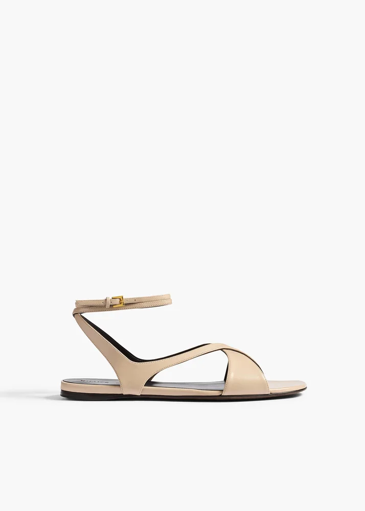 Liria Ankle Strap Flat Sandal in Nude Glazed Leather