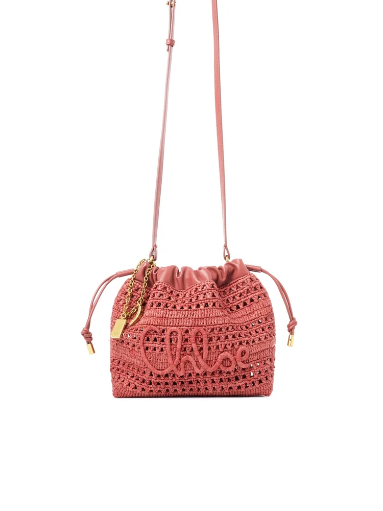Mini Summer Banana drawstring shoulder bag in raffia