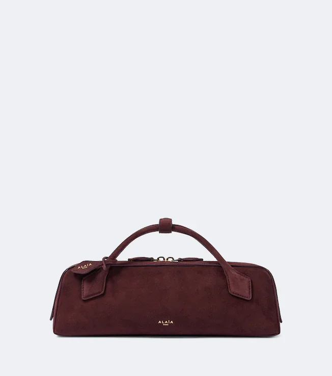 Le Teckel suede clutch