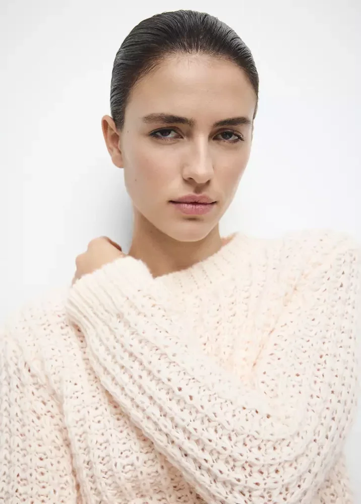 Knit sweater with lace pattern