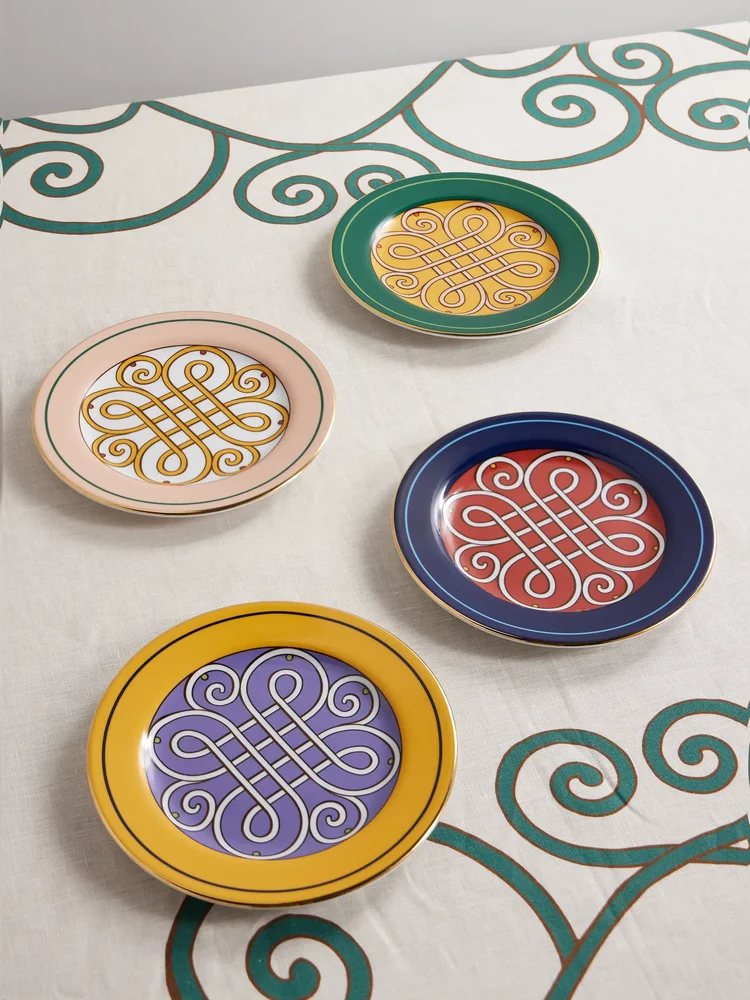 Set of four printed porcelain dessert plates